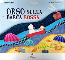 Orso sulla barca rossa